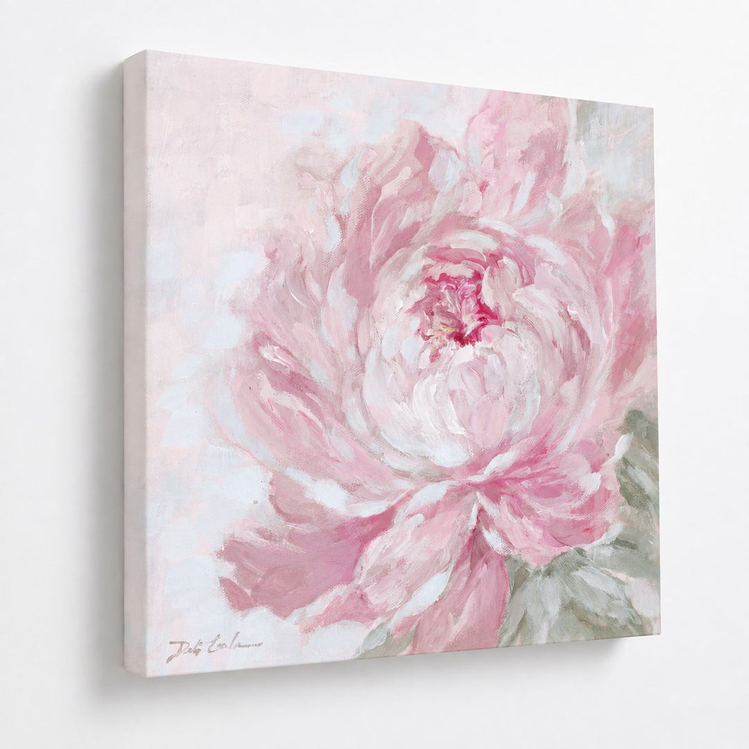 Softly Unfolding peony canvas print featuring a large painterly blush pink and white peony with muted sage green leaves, displayed at an angle on a white wall showing the 1.5-inch deep gallery-wrapped canvas.