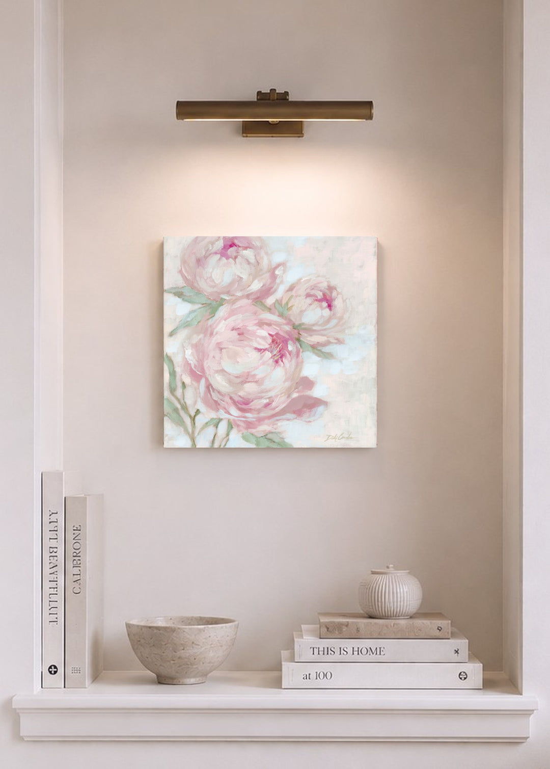 A Secret Kept in Bloom pink peony wall art displayed in a soft neutral alcove with warm lighting and elegant home décor.