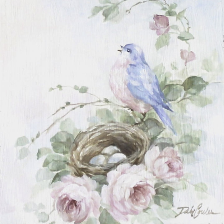 Shabby-chic painting of bluebird singing above a nest resting on roses.
