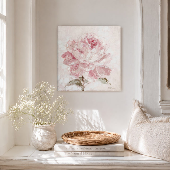 Pink peonie canvas artwork in acrylics on a wall above a shelf with decor items