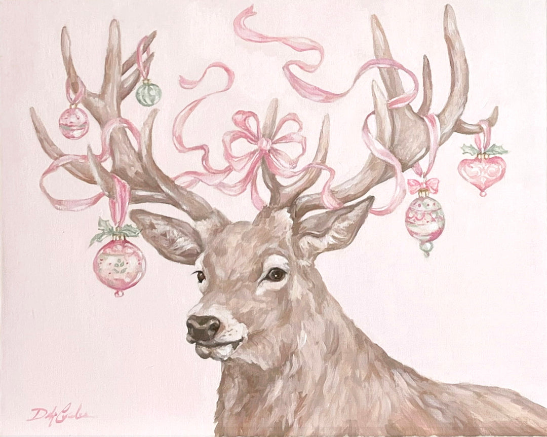 Decorative illustration of a deer on a light pink background with pink Christmas ornaments hanging from its antlers .