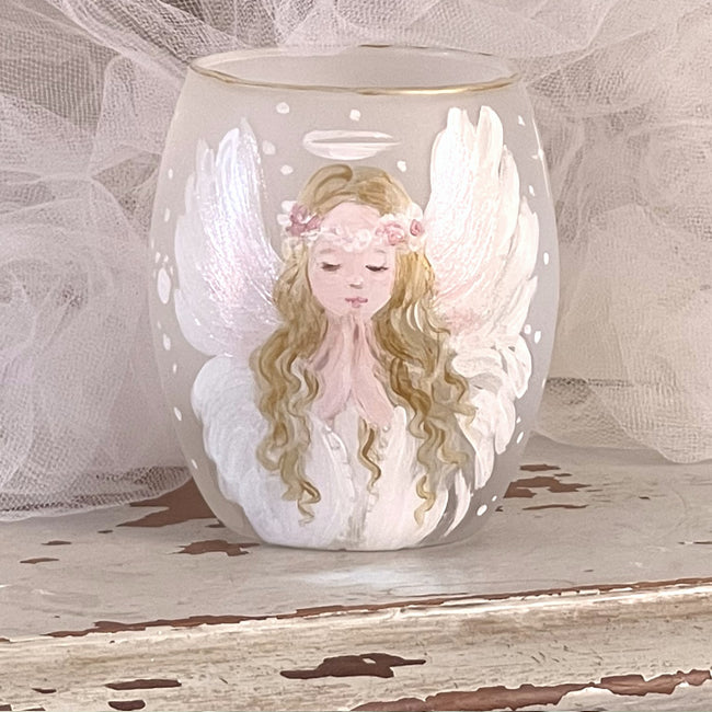Beautiful hand-painted christmas votive holder featuring a praying angel