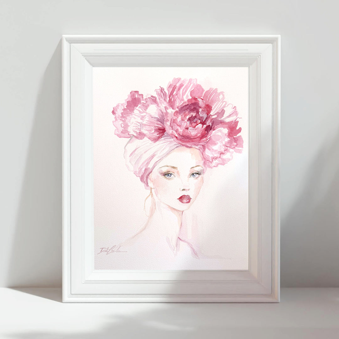 Framed artwork of a woman with a pink floral headpiece on a white background