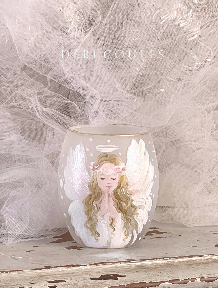 Decorative glass votive candle vase with an angel portrait hand-painted on the surface