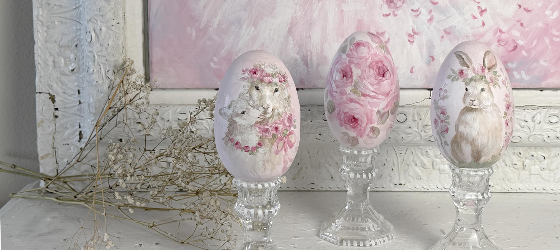 Shabby-chic Easter Eggs hand-painted with lambs, Easter Bunny, and rose blossoms on display for upscale décor.