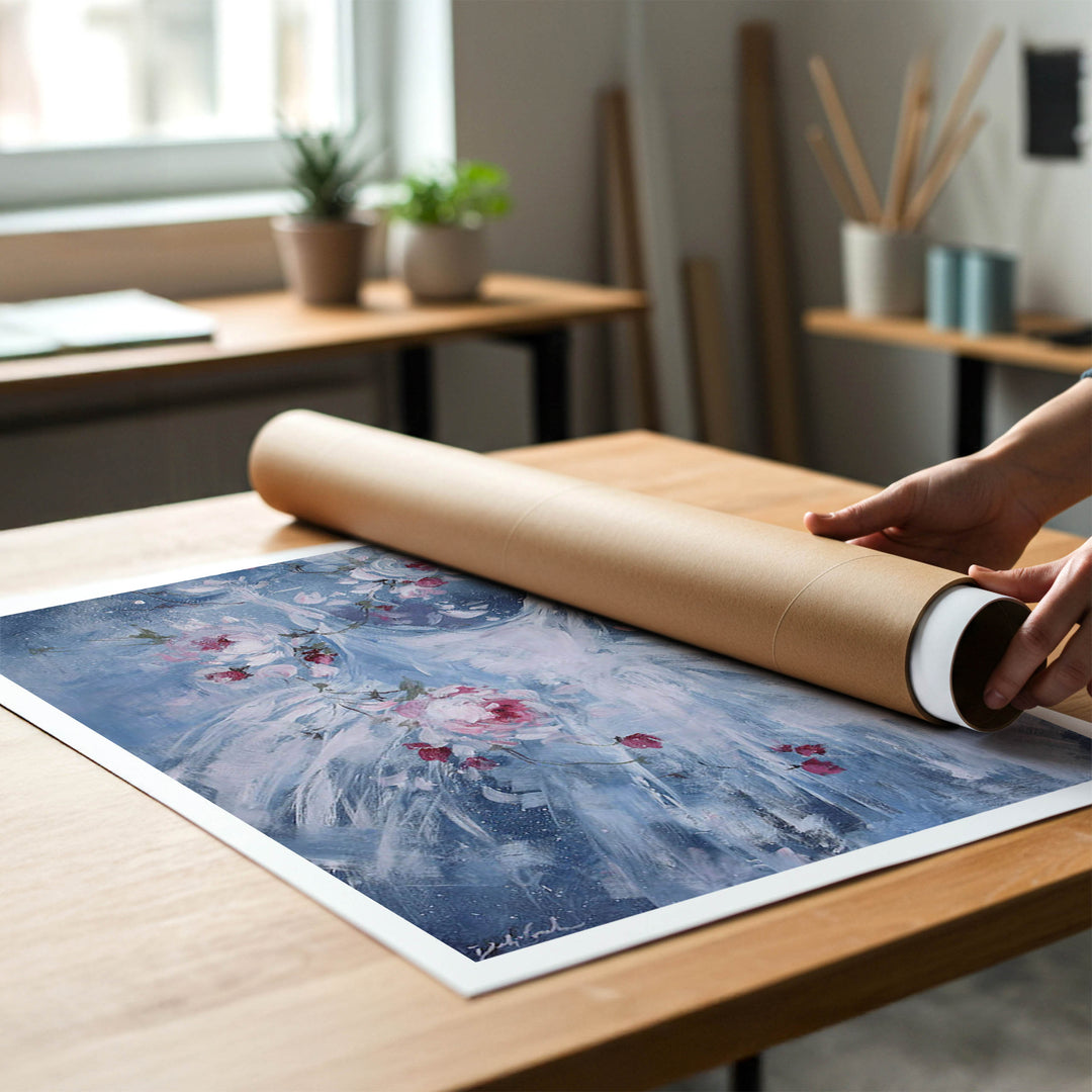Person rolling a shabby-chic fine art print of a ballet painting to place in a cardboard mailing tube.