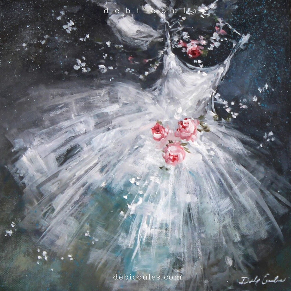 A pure white tutu dress dances across the canvas of stars with pink roses and white flowers swirling