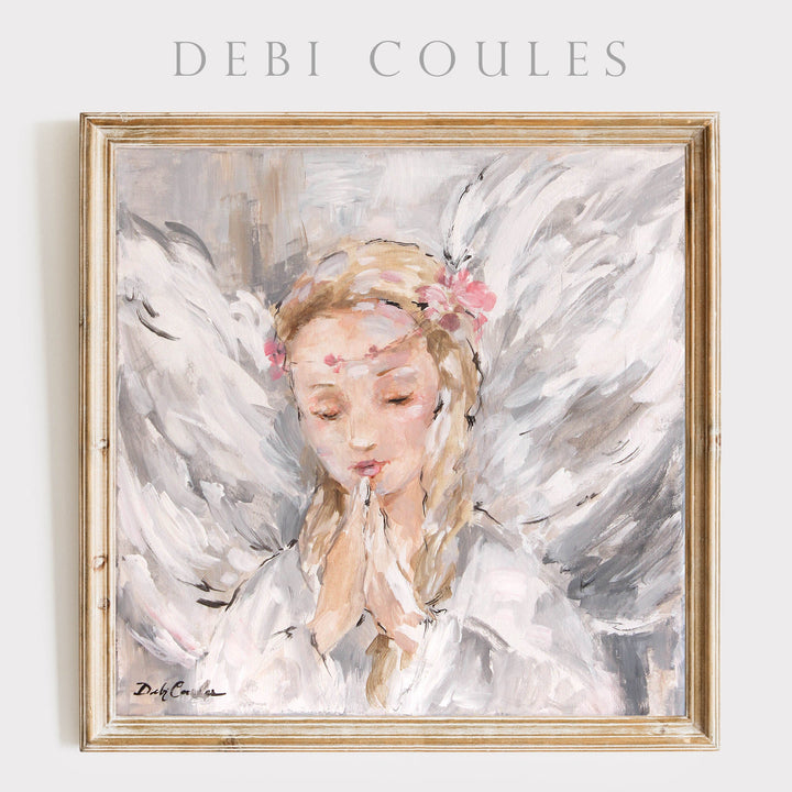 Paper print of a rose crowned angel in prayer.