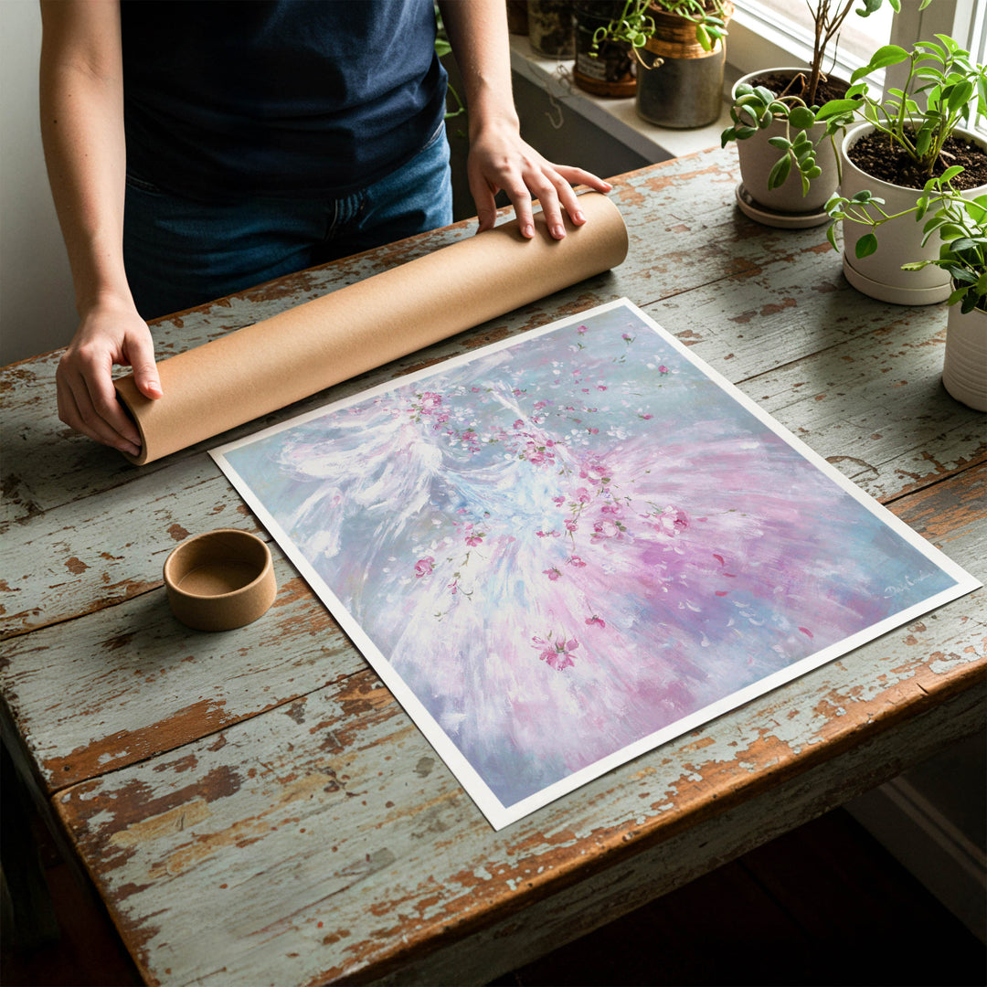Person rolling up an unstretched canvas print of shabby chic ballet artwork to be placed in a cardboard mailing tube
