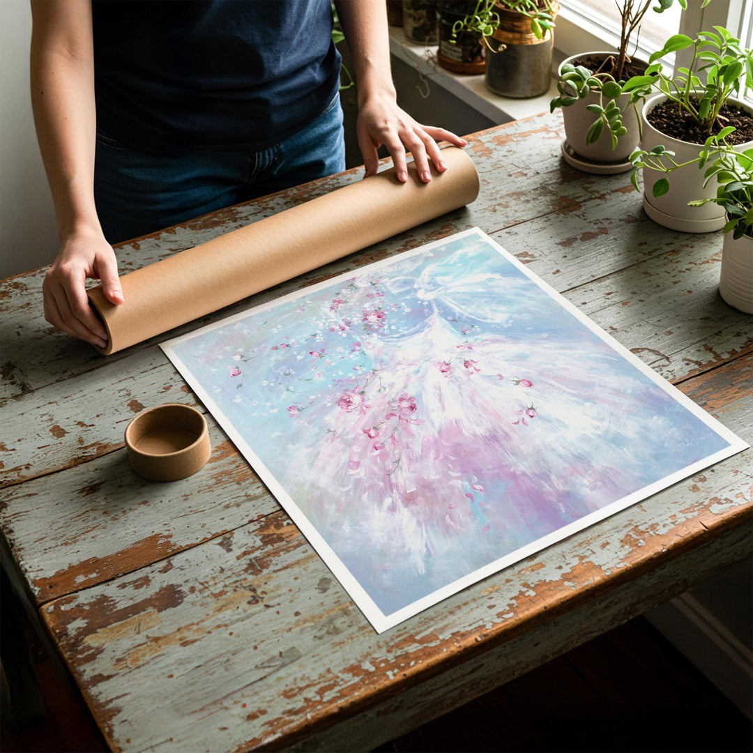 Person rolling up an unstretched canvas print of shabby chic ballet artwork to be placed in a cardboard mailing tube
