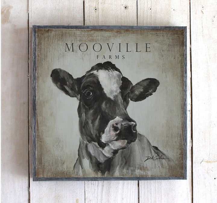 Mooville Farms, a fine black and white Jersey cow strikes a proud pose. Robin's egg blue background with lots of distressing. Part of the Farmhouse Series from Debi Coules Art. Framed in 1 1/2" barnwood.