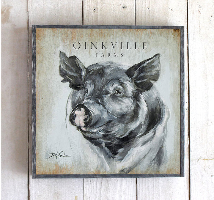 Oinkville Farms, a fine black and white pig strikes a proud pose. Robin's egg blue background with lots of distressing. Part of the Farmhouse Series from Debi Coules Art
