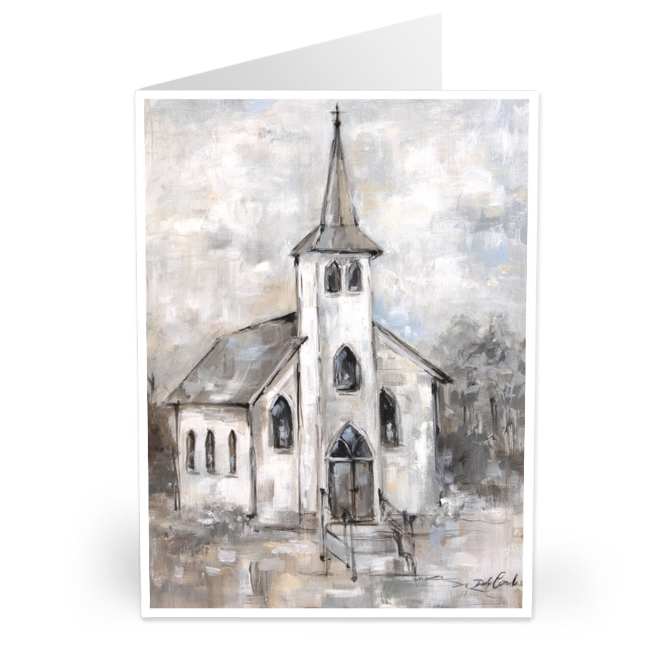 Greeting card, a vintage old chapel with a towering steeple, lines of black give form while the entire image is done in greys, whites and tans, almost surreal with candles in the windows