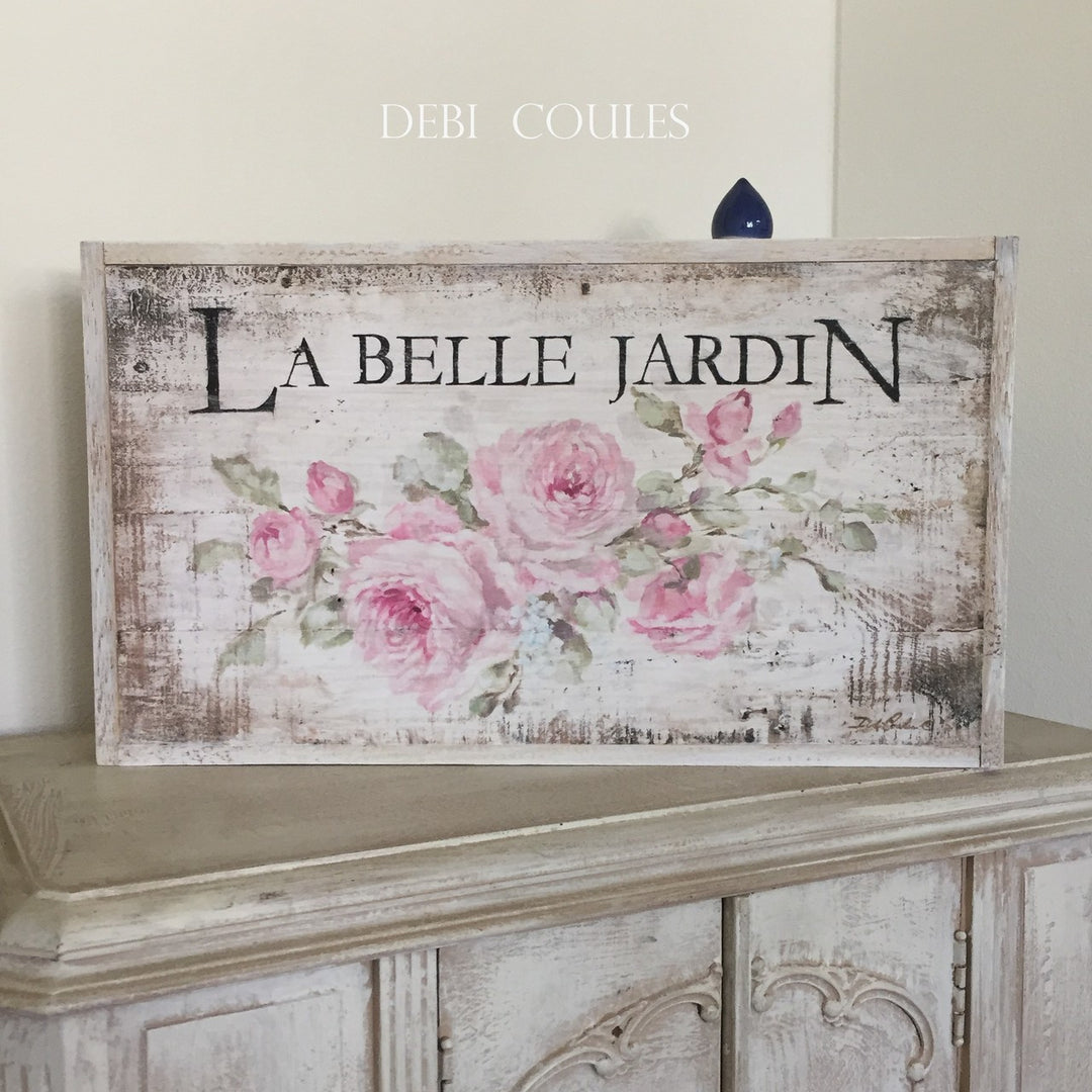 "The beautiful garden" La Belle Jardin. A wood print version of one of our signs. Pink roses on a background of off white and browns. Distressing all around. Printed on wood, framed in wood  by Debi Coules